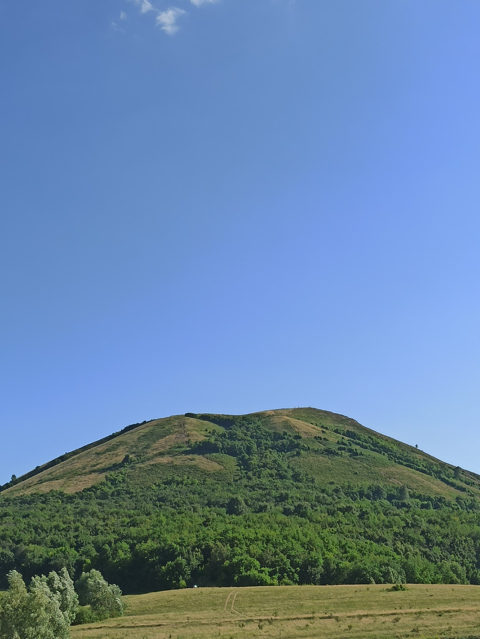 Тау артында кояш бар